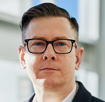 CEO-portret van Alexander Hughes, directeur van cryptohandelsbedrijf